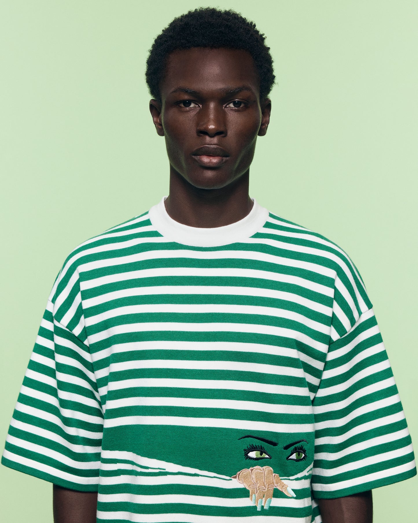 KNITTED PEEPING TEE IN GREEN