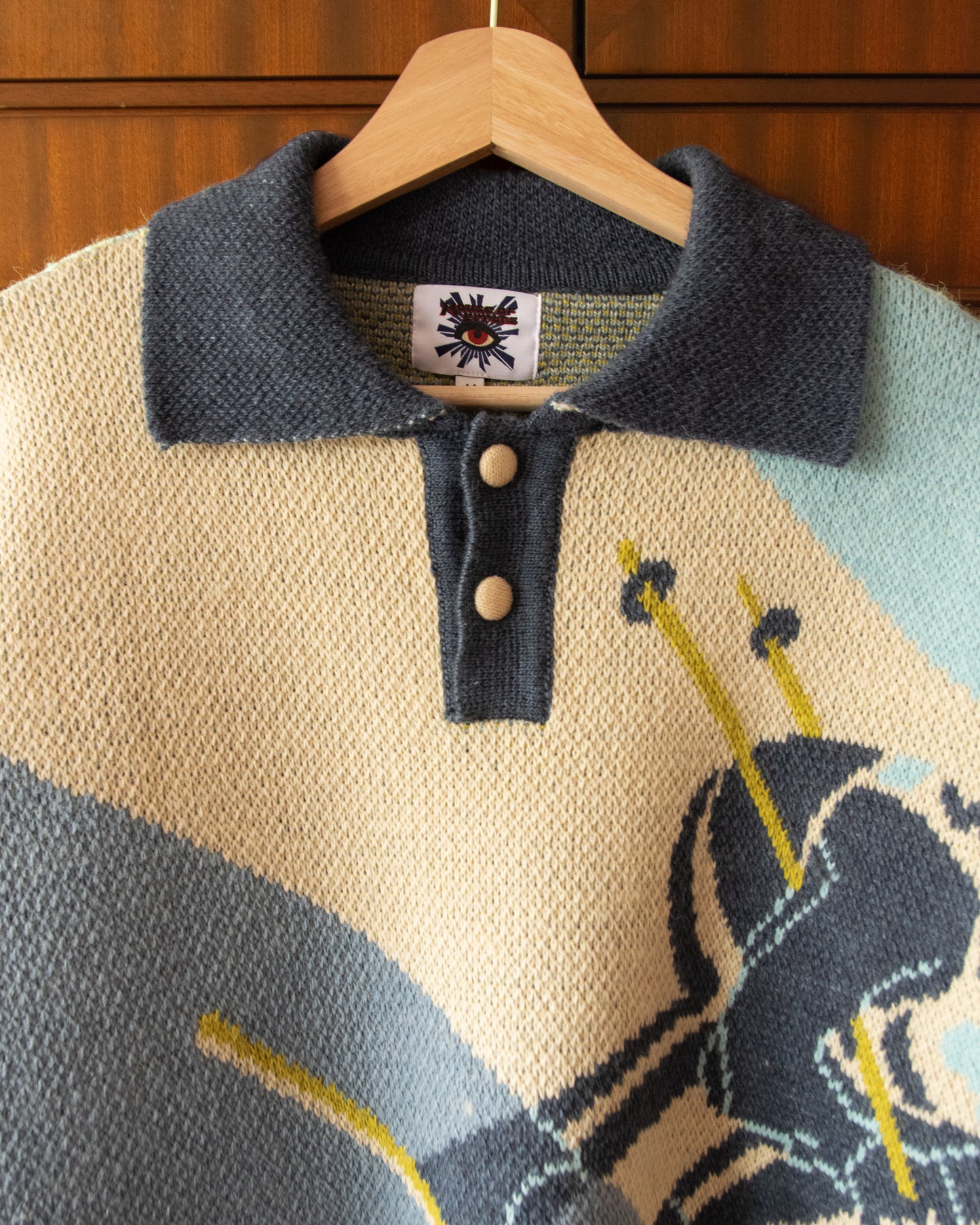 KNITTED SKI JUMPER WITH EMBROIDERED POSTCARDS