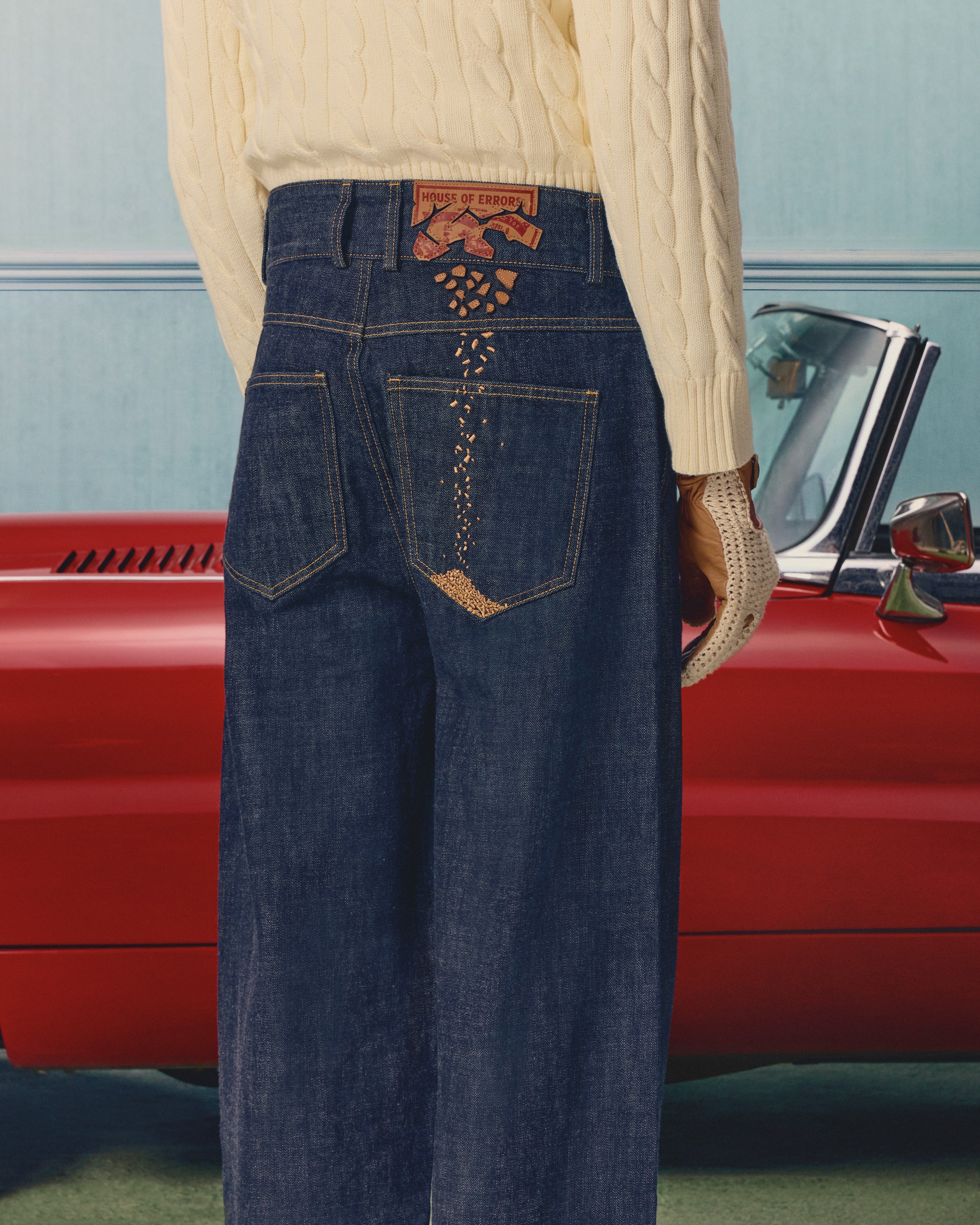 CRUMBLING PATCH JEANS