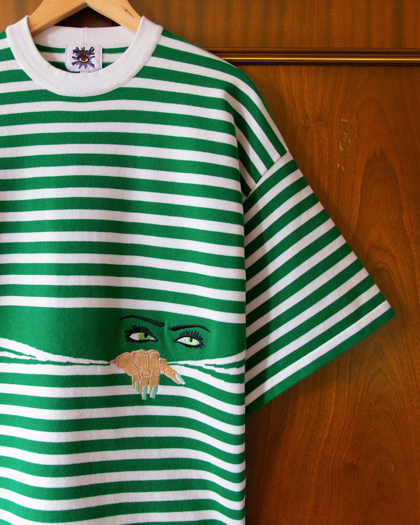 KNITTED PEEPING TEE IN GREEN
