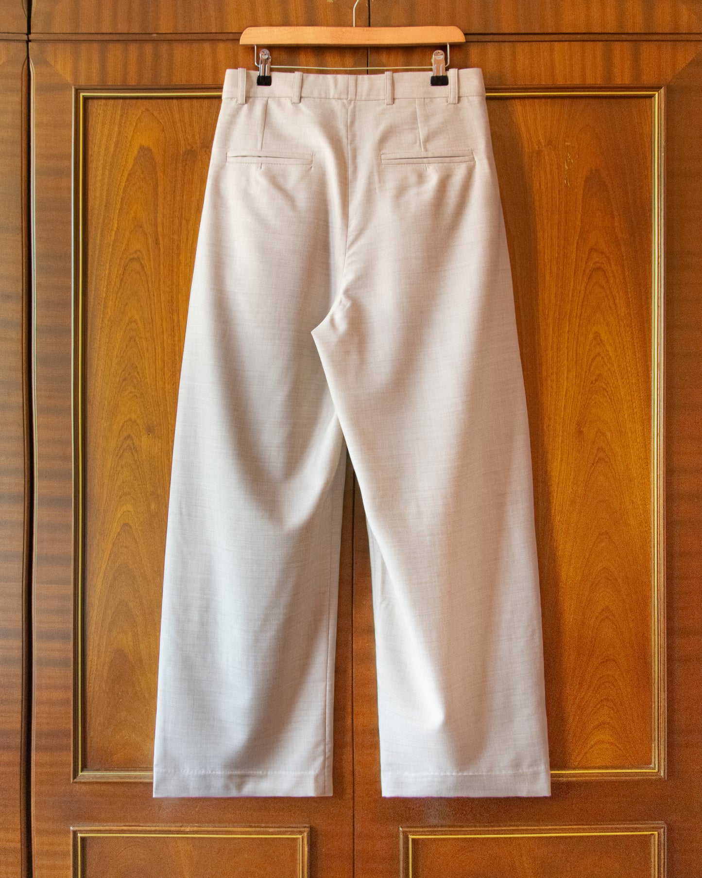 PLEATED WOOL FLOCK TROUSERS IN CREAM