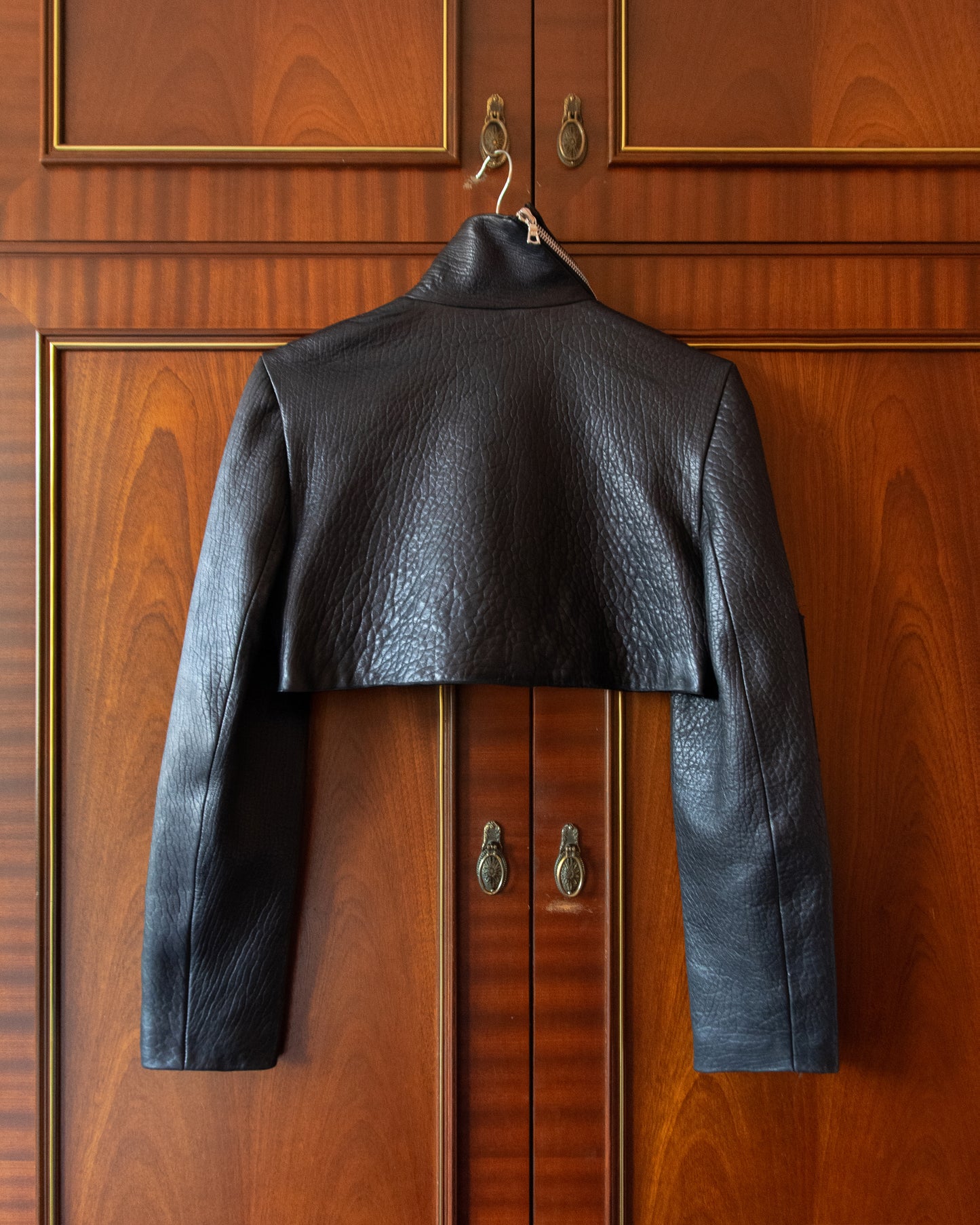ORIGAMI FLOWER JACKET FROM BLACK LEATHER