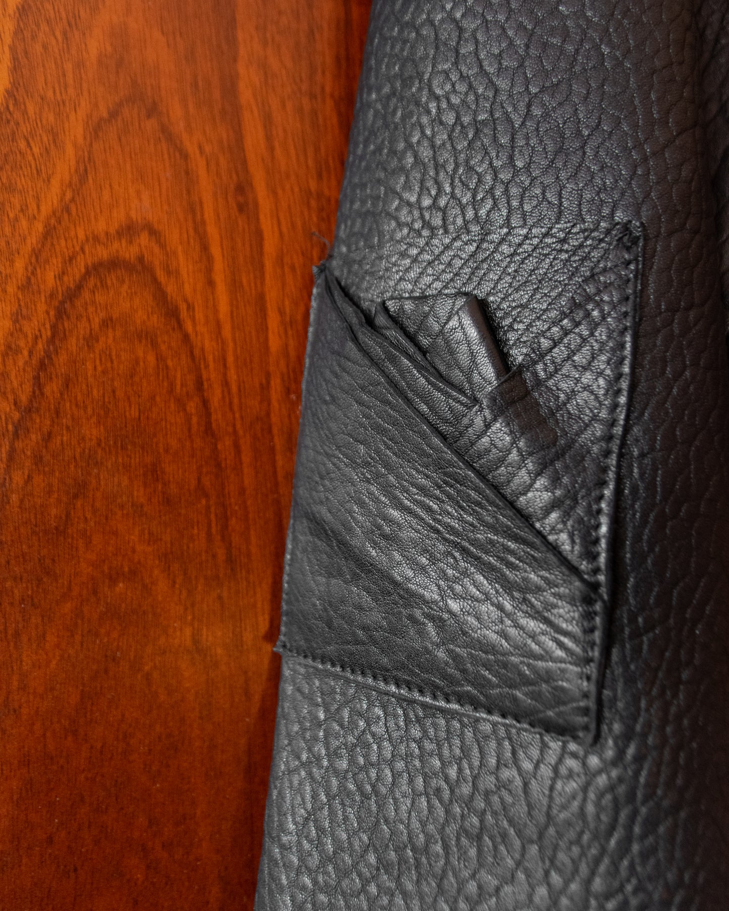 ORIGAMI FLOWER JACKET FROM BLACK LEATHER