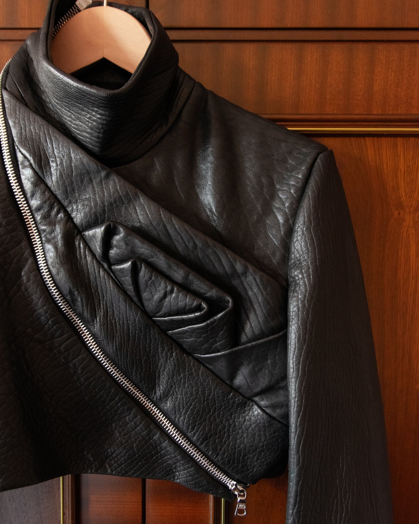 ORIGAMI FLOWER JACKET FROM BLACK LEATHER