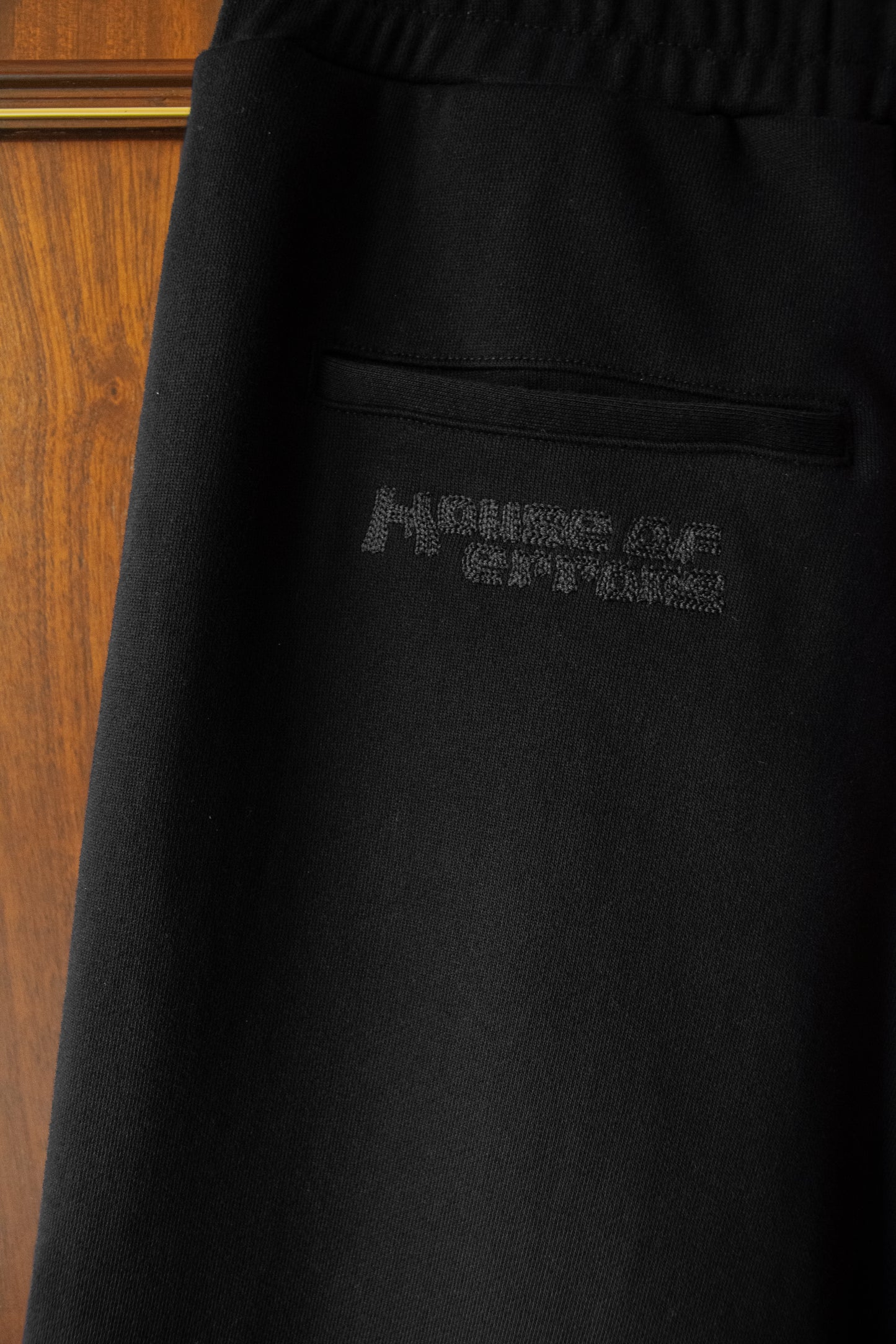 PLEATED JOGGERS IN BLACK