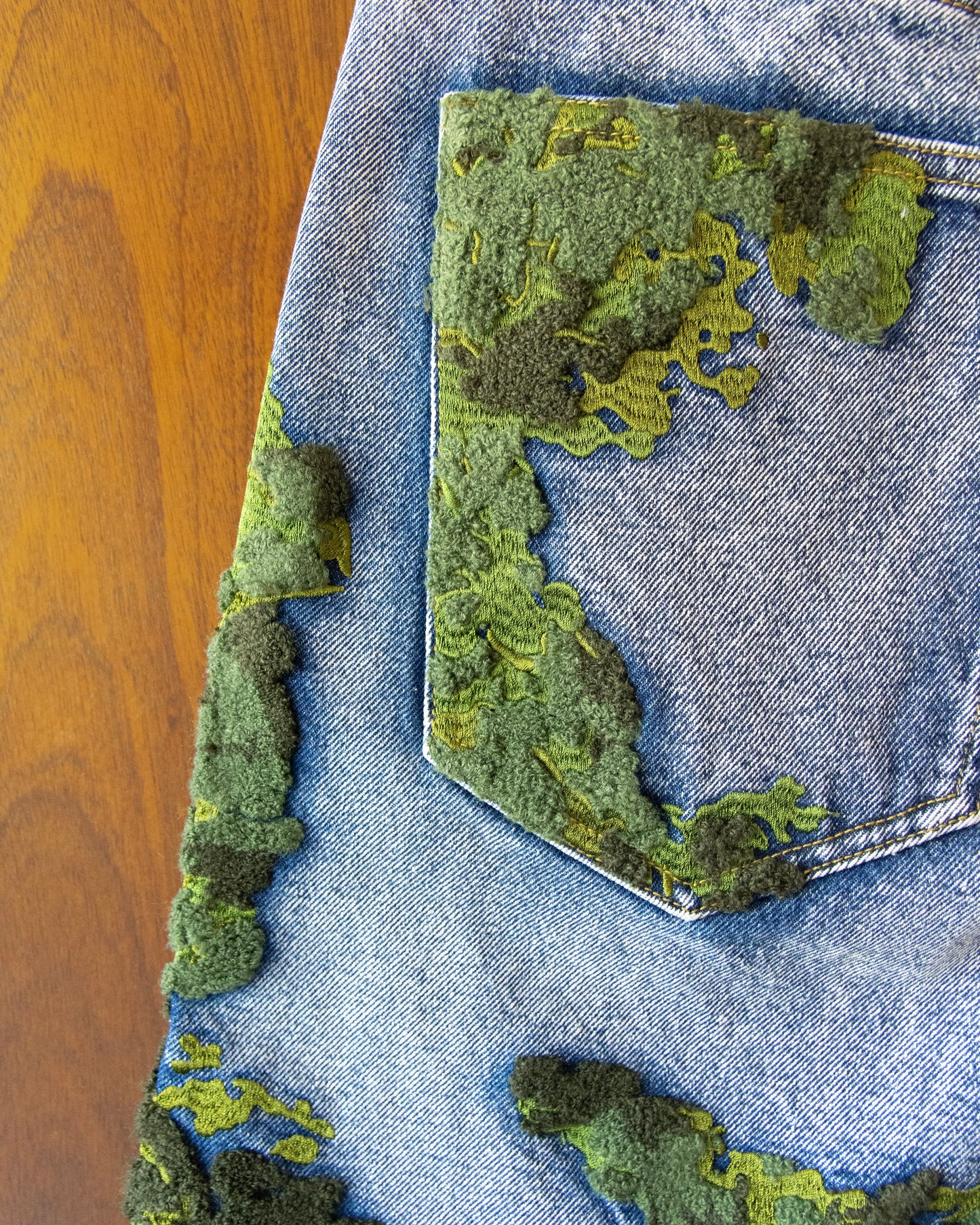 EMBROIDERED MOSS JEANS