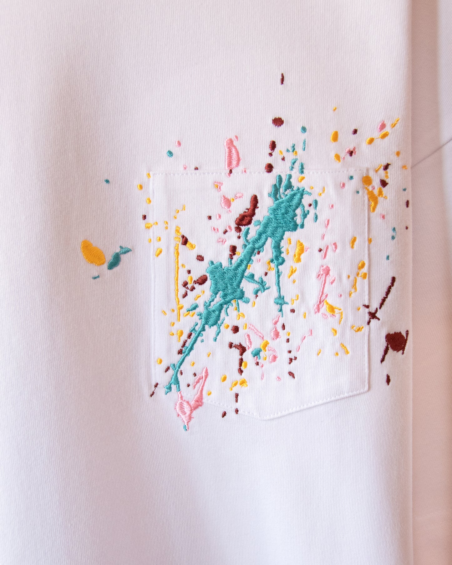 EMBROIDERED PAINT SPLATTER TEE
