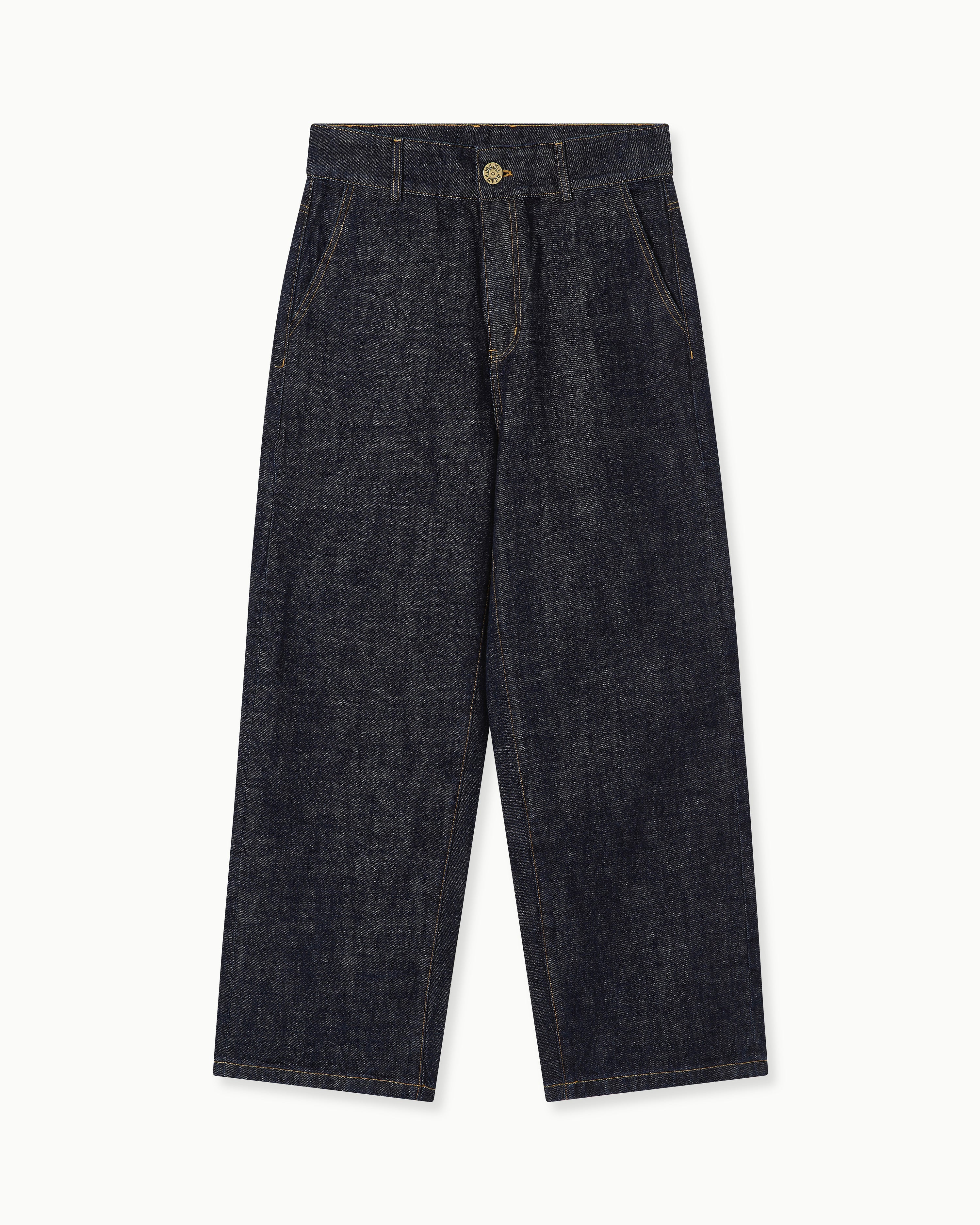 CRUMBLING PATCH JEANS