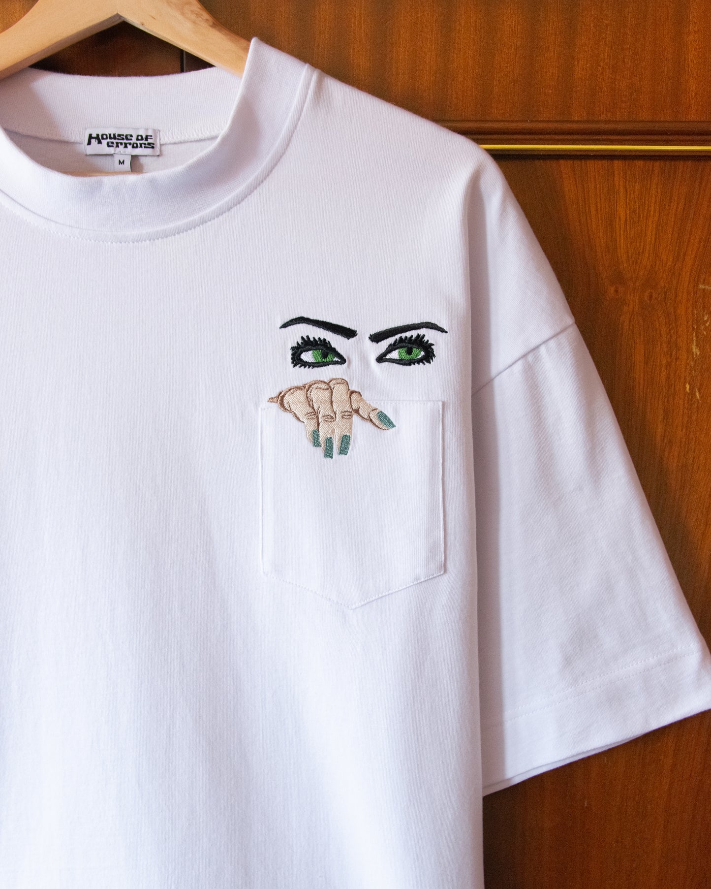 PEEPING TEE