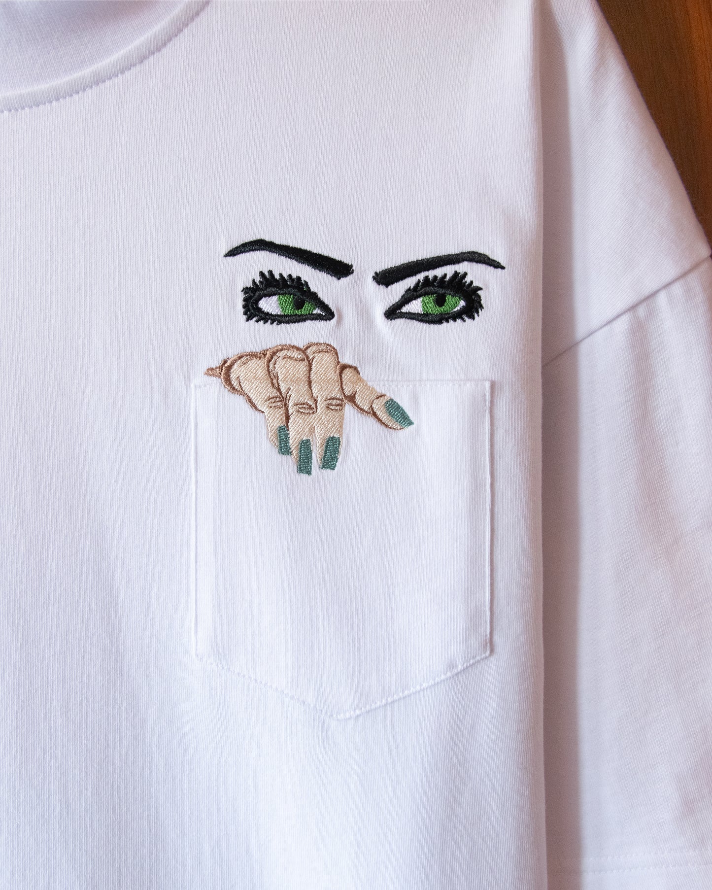 PEEPING TEE